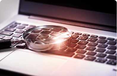 Laptop keyboard with magnifying glass